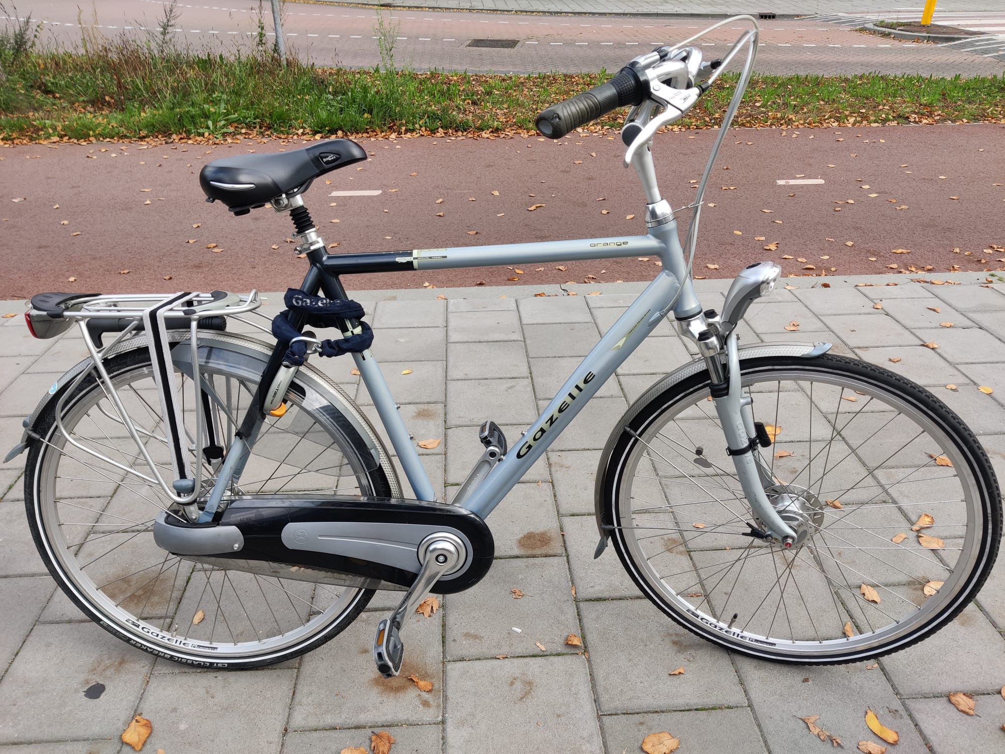 Gazelle Orange herenfiets 61cm met 7 versnellingen en verende voorvork.